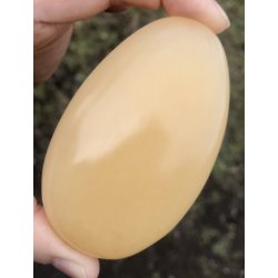 Gul honing calcit hndstykke. Ca. 200gram. 9cm